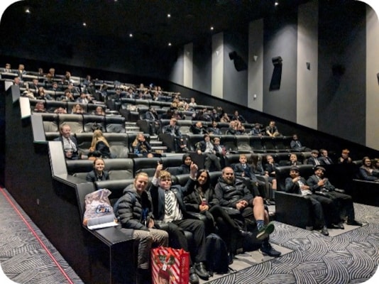 Students Celebrate Achievements with Cinema Trip